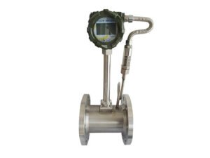 Temperature/pressure compensated eddy current flowmeter
